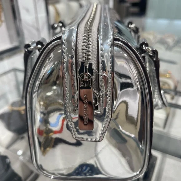 MICHAEL KORS Jet Set Small Patent Duffel Xbody Crossbody Bag
Silver 
NWT - Picture 15 of 16